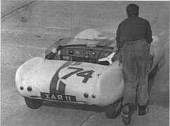 Doc Wyllie pushes #275 into the pits