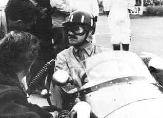 a determined Graham Hill in his 12 